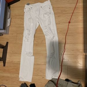 White Levis Jeans with rips size 28W/30L